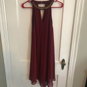 Red cocktail dress with gold embellished collar